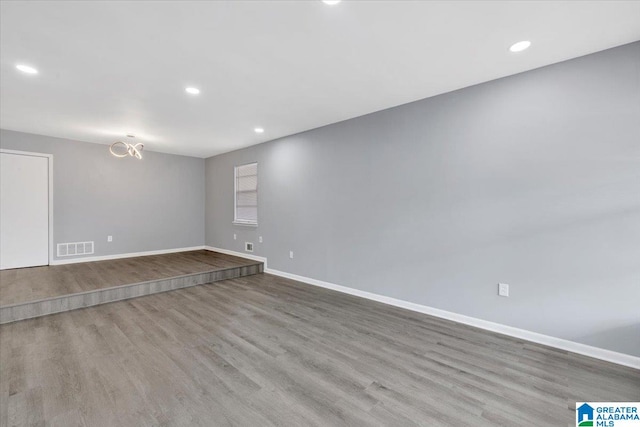 spare room with light wood-type flooring