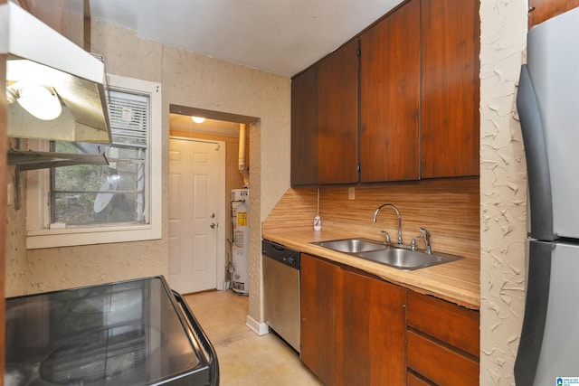 kitchen featuring stainless steel appliances, sink, and gas water heater