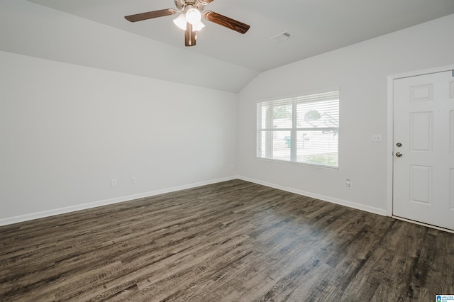 unfurnished room featuring dark wood-type flooring, ceiling fan, and lofted ceiling