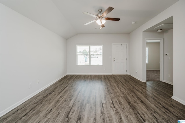 unfurnished room with lofted ceiling, ceiling fan, and dark hardwood / wood-style flooring