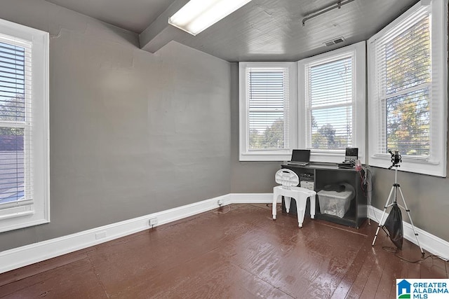 office area featuring dark wood-type flooring and a wealth of natural light