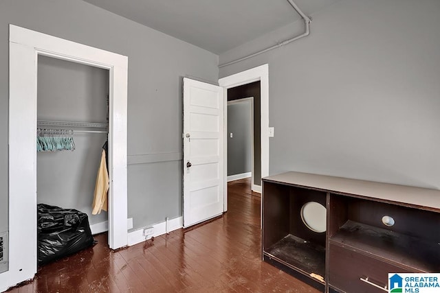 interior space with dark hardwood / wood-style floors