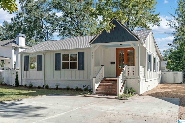 view of front of property featuring french doors