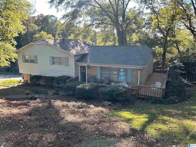 view of front of home featuring a wooden deck