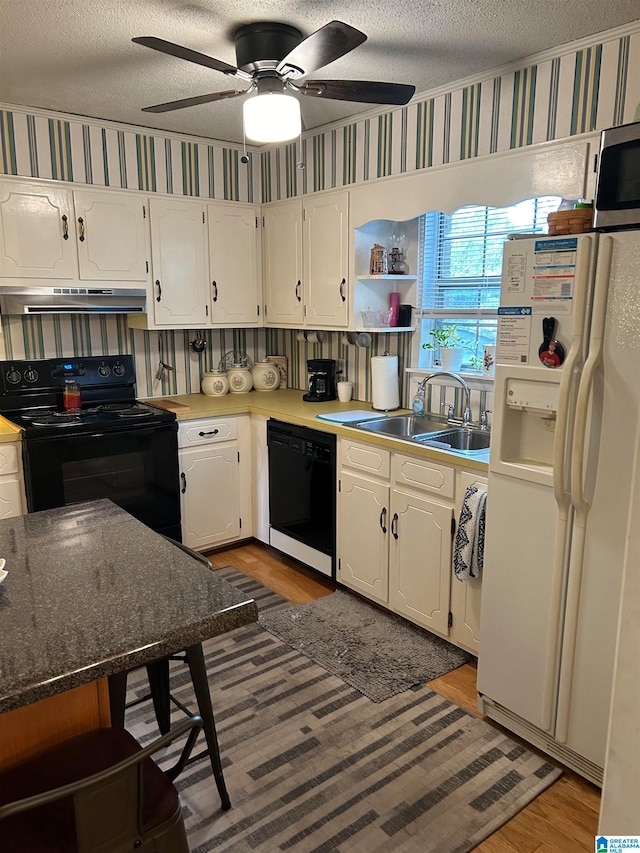 kitchen with white fridge with ice dispenser, sink, dishwasher, white cabinetry, and dark wood-type flooring