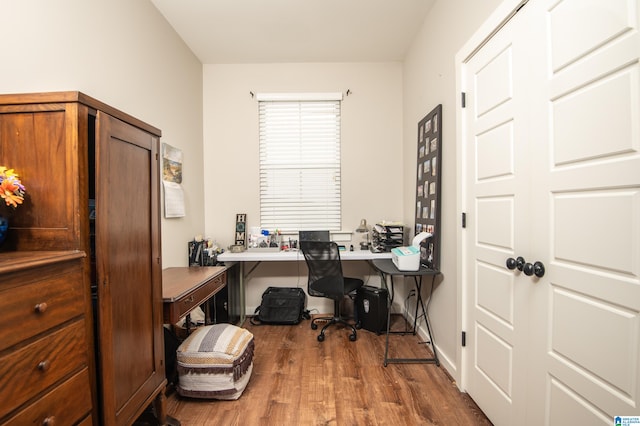 office space with hardwood / wood-style floors