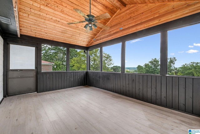 unfurnished sunroom with ceiling fan, wooden ceiling, and vaulted ceiling with beams