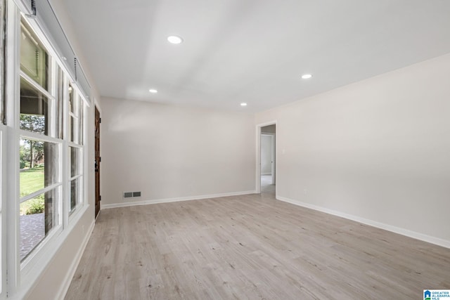 empty room featuring light hardwood / wood-style floors