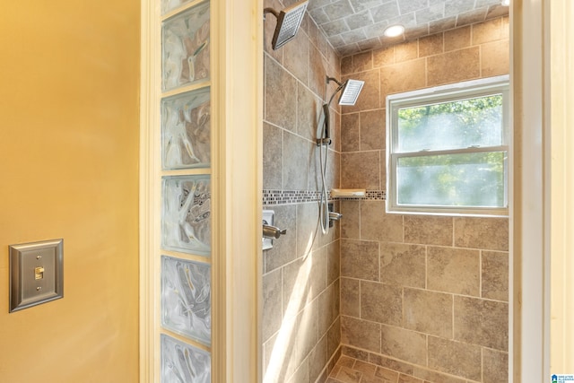 bathroom featuring tiled shower