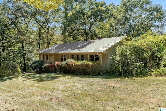 exterior space with a lawn