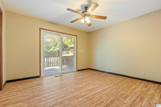 empty room with light wood-type flooring and ceiling fan