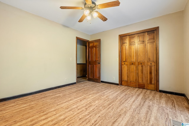 unfurnished bedroom featuring a closet, ceiling fan, and light hardwood / wood-style floors