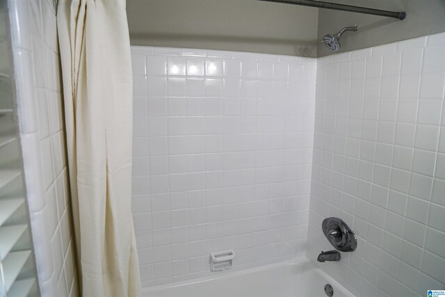 bathroom with shower / tub combo