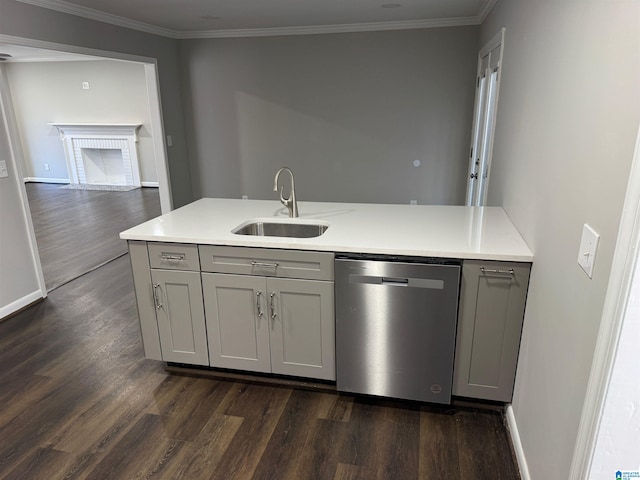 kitchen with gray cabinetry, sink, dishwasher, dark hardwood / wood-style flooring, and ornamental molding