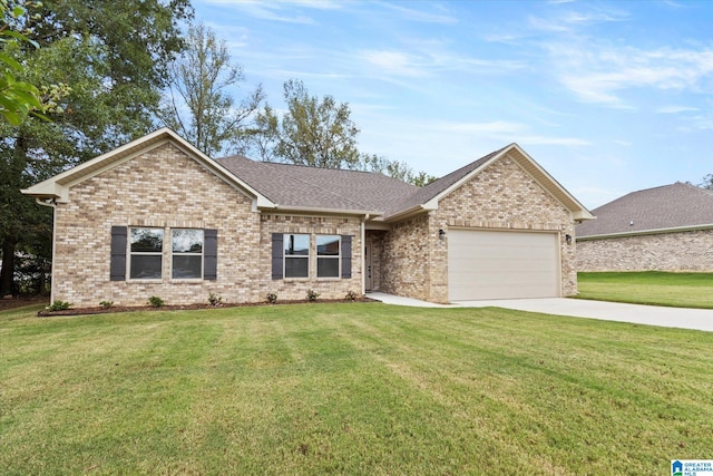 view of front of home with a front lawn and a garage