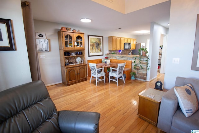 living room with light hardwood / wood-style floors