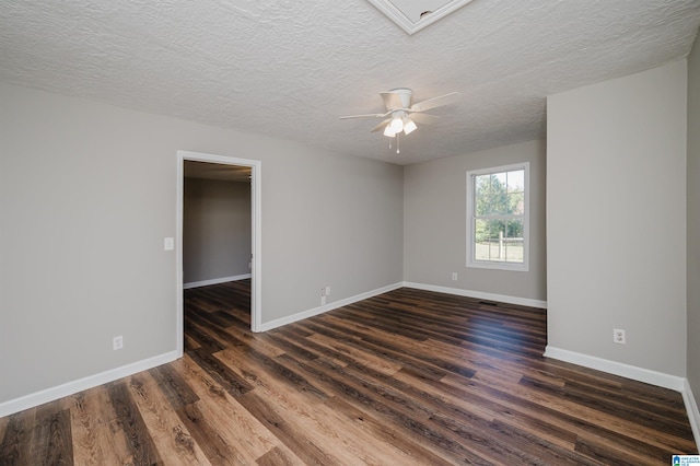 unfurnished room featuring ceiling fan, a textured ceiling, and dark hardwood / wood-style flooring