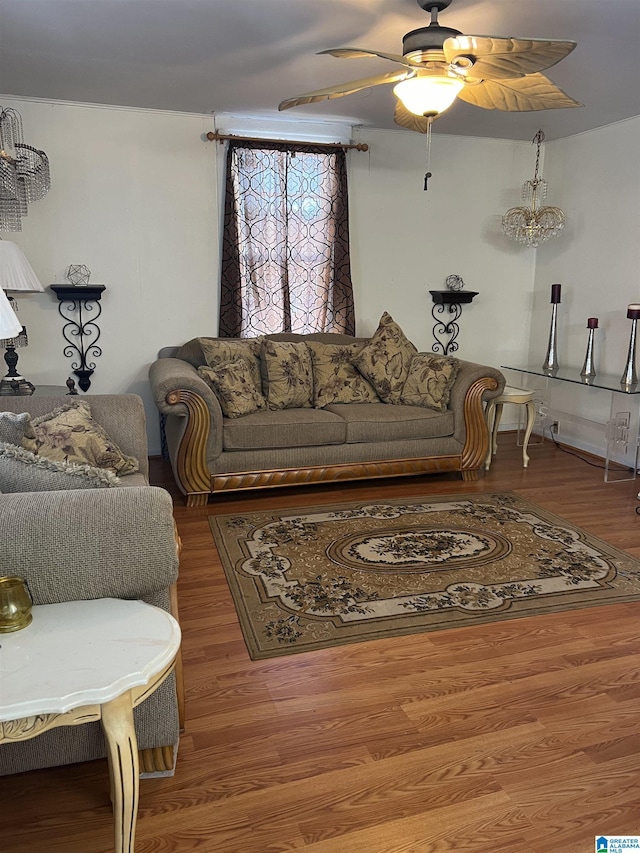 living room featuring ceiling fan and wood finished floors