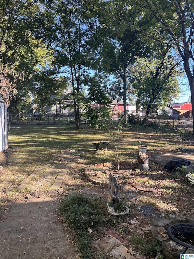 view of yard with fence