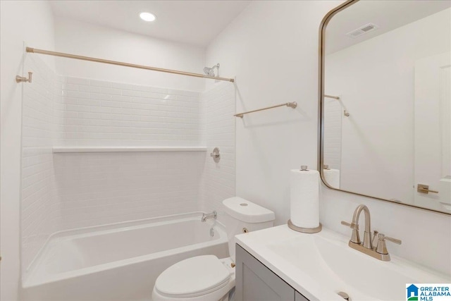 full bathroom featuring vanity, toilet, and  shower combination