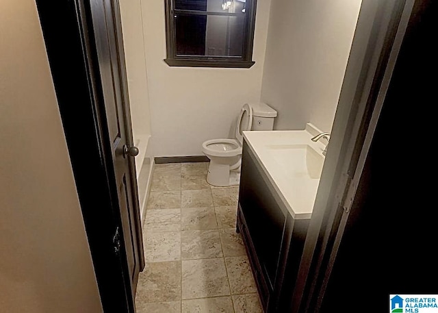 full bathroom with vanity, toilet, and separate shower and tub