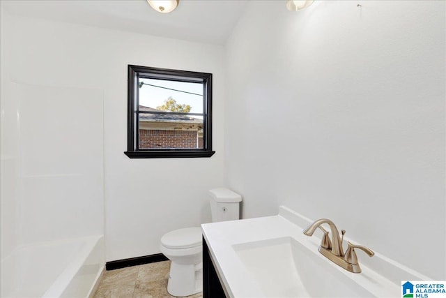 full bathroom with toilet, vanity, tile patterned floors, and shower / bath combination