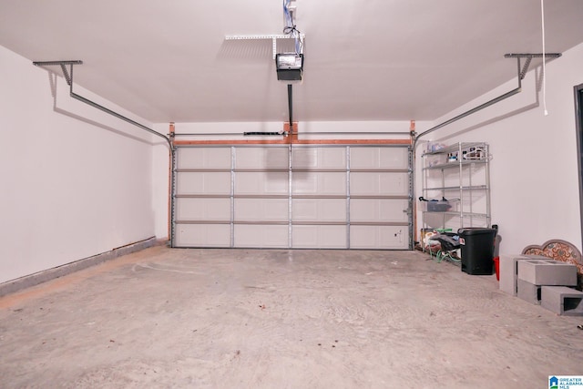 garage featuring a garage door opener