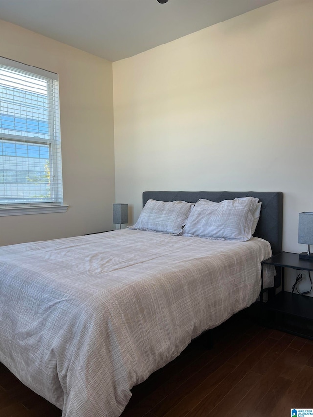 bedroom featuring dark hardwood / wood-style floors