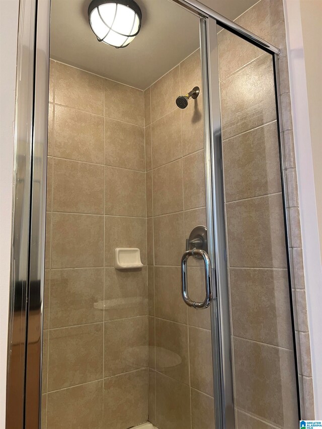 bathroom featuring walk in shower