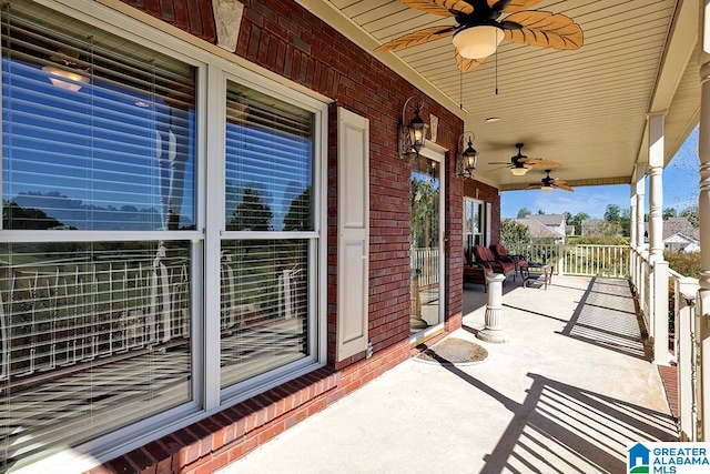 view of patio featuring ceiling fan and covered porch