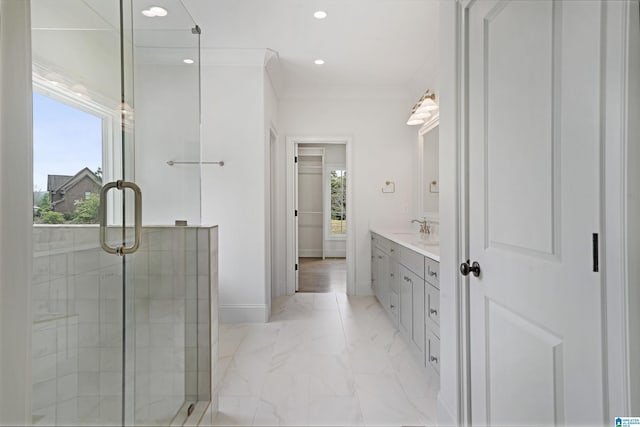 bathroom with vanity, marble finish floor, recessed lighting, baseboards, and a shower stall