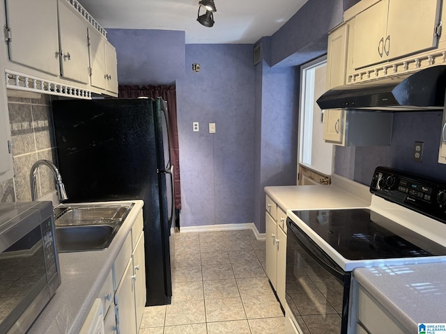 kitchen featuring sink, decorative backsplash, light tile patterned floors, and white electric stove