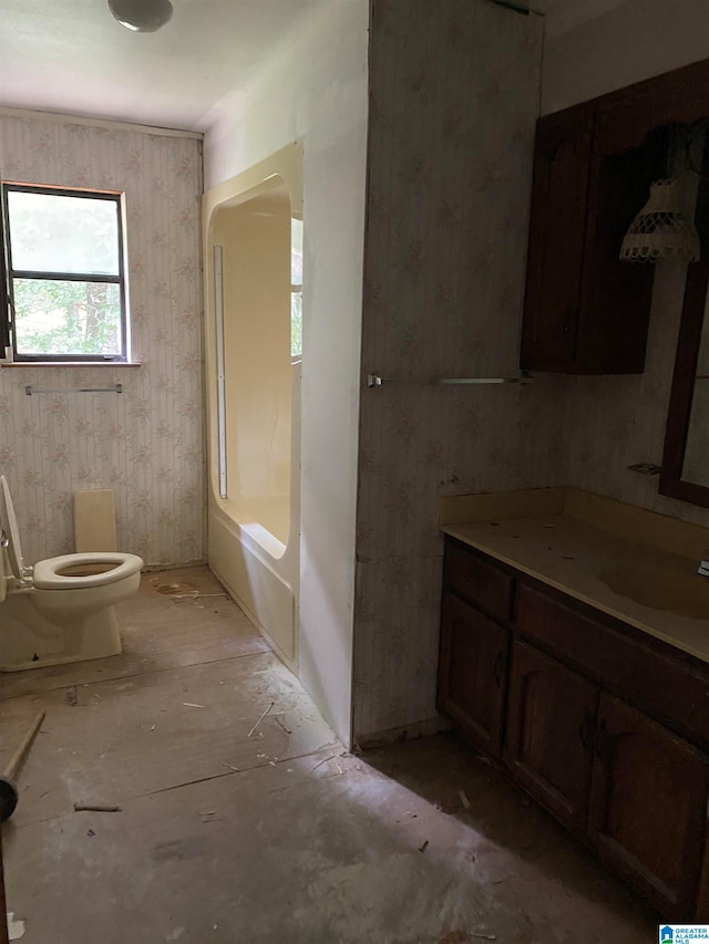 bathroom with vanity and toilet