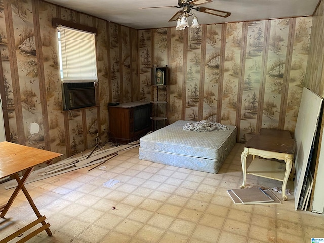 sitting room with cooling unit and ceiling fan