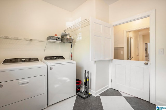 clothes washing area with washer and dryer