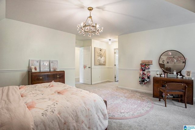 bedroom with light colored carpet and an inviting chandelier