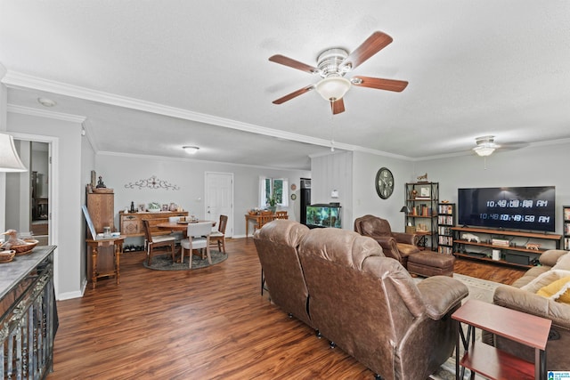 living room featuring ornamental molding, dark hardwood / wood-style floors, and ceiling fan