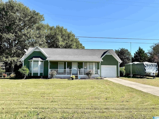 single story home featuring covered porch, a garage, and a front lawn