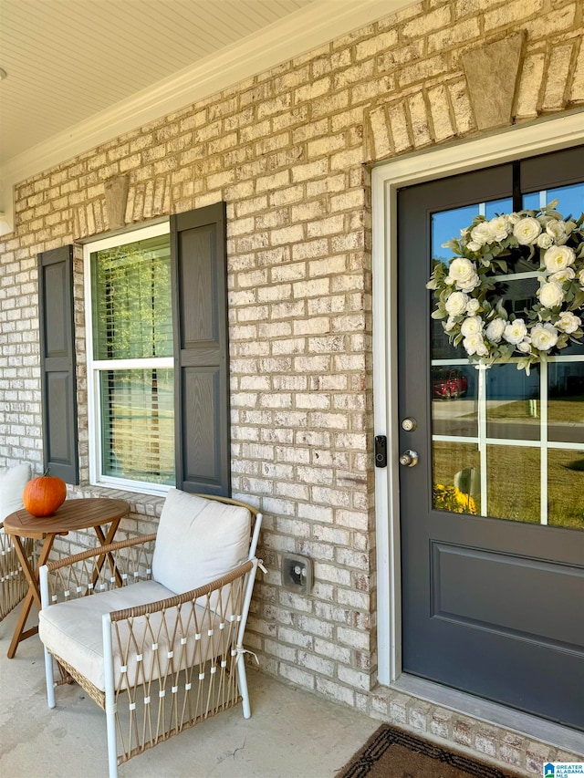 entrance to property featuring a porch