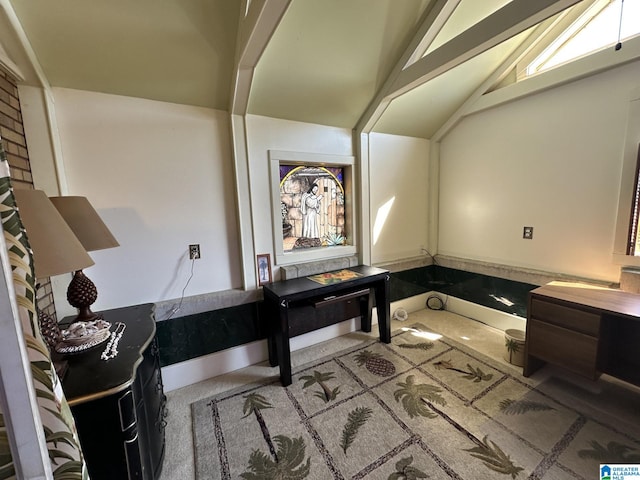 bathroom with lofted ceiling