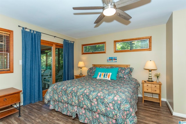 bedroom with access to exterior, dark hardwood / wood-style floors, and ceiling fan