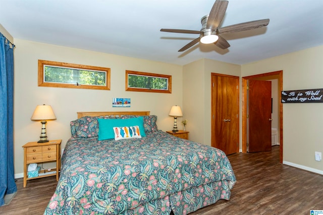 bedroom featuring dark hardwood / wood-style flooring and ceiling fan