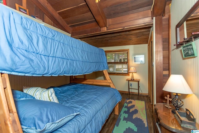 bedroom featuring vaulted ceiling with beams, wood ceiling, and dark hardwood / wood-style flooring