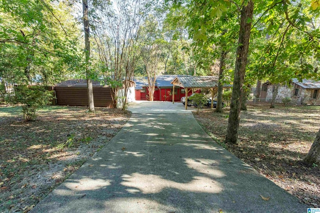 exterior space with a carport