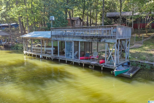 dock area with a water view