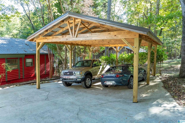 view of parking / parking lot featuring a carport