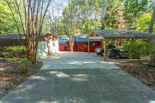 view of vehicle parking featuring a carport