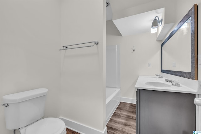 full bathroom with vanity, toilet, wood-type flooring, and plus walk in shower