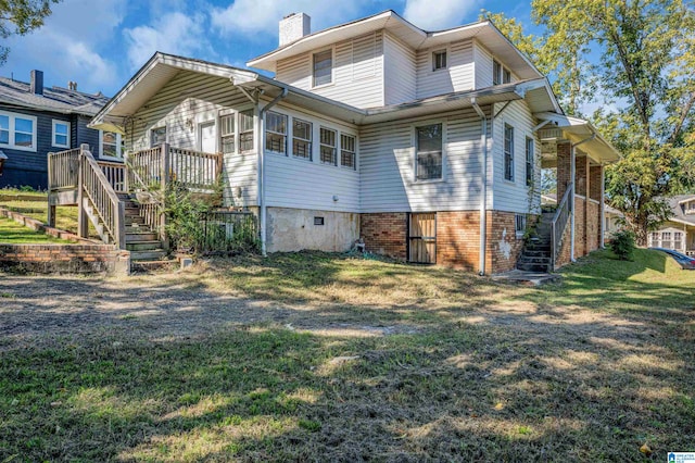 exterior space featuring a yard and a deck