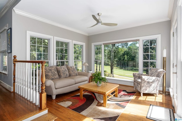 sunroom / solarium with ceiling fan